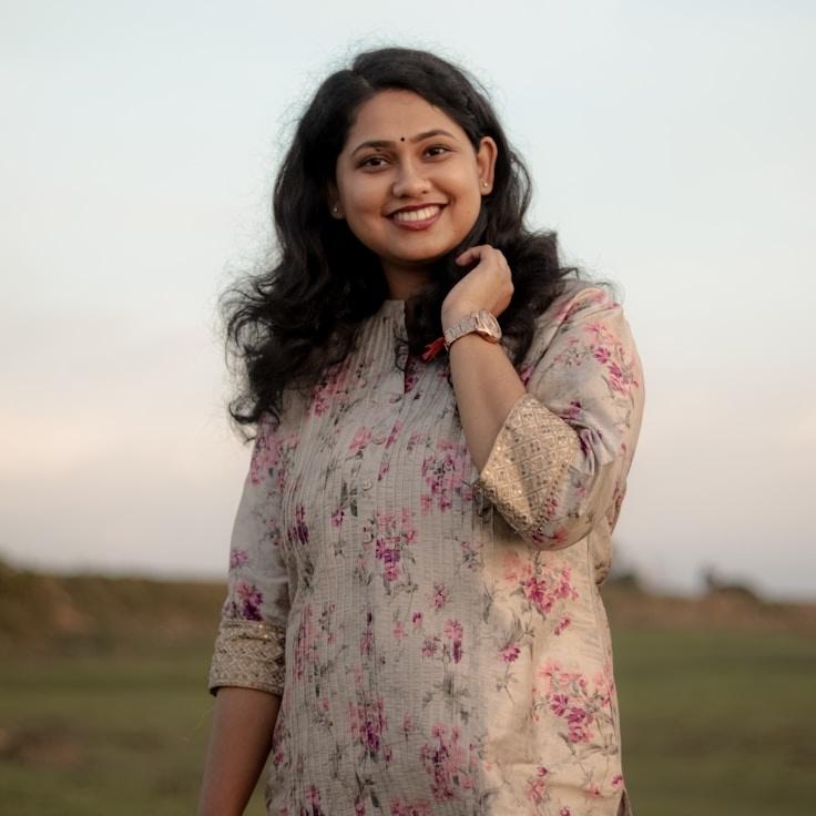 Riley Kapoor, Client Relations Director, discussing corporate gifting strategy with business clients